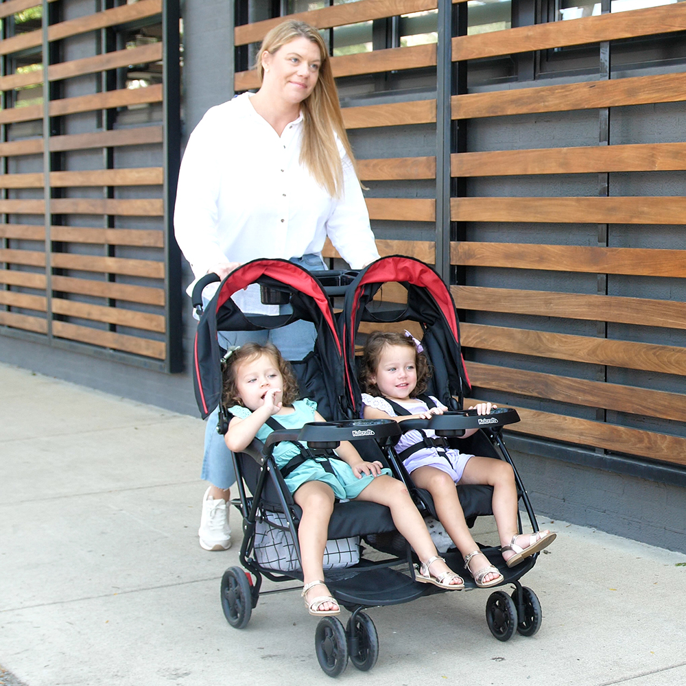 mom with two toddlers in Kolcraft stroller