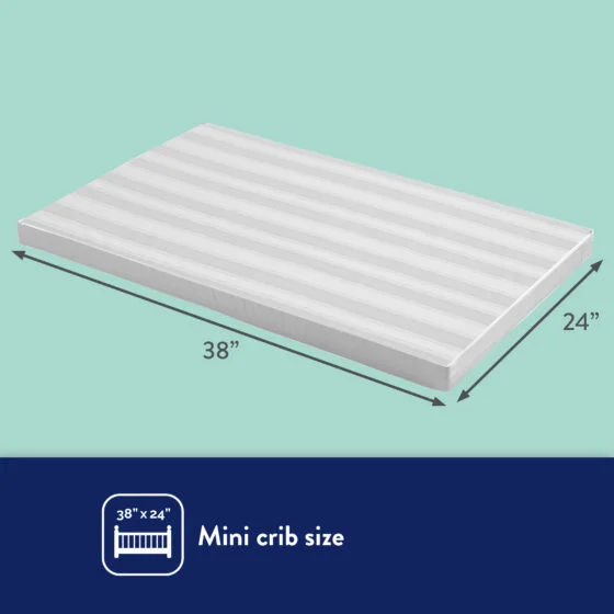 Kolcraft Pediatric Mini Crib Mattress Laying Down