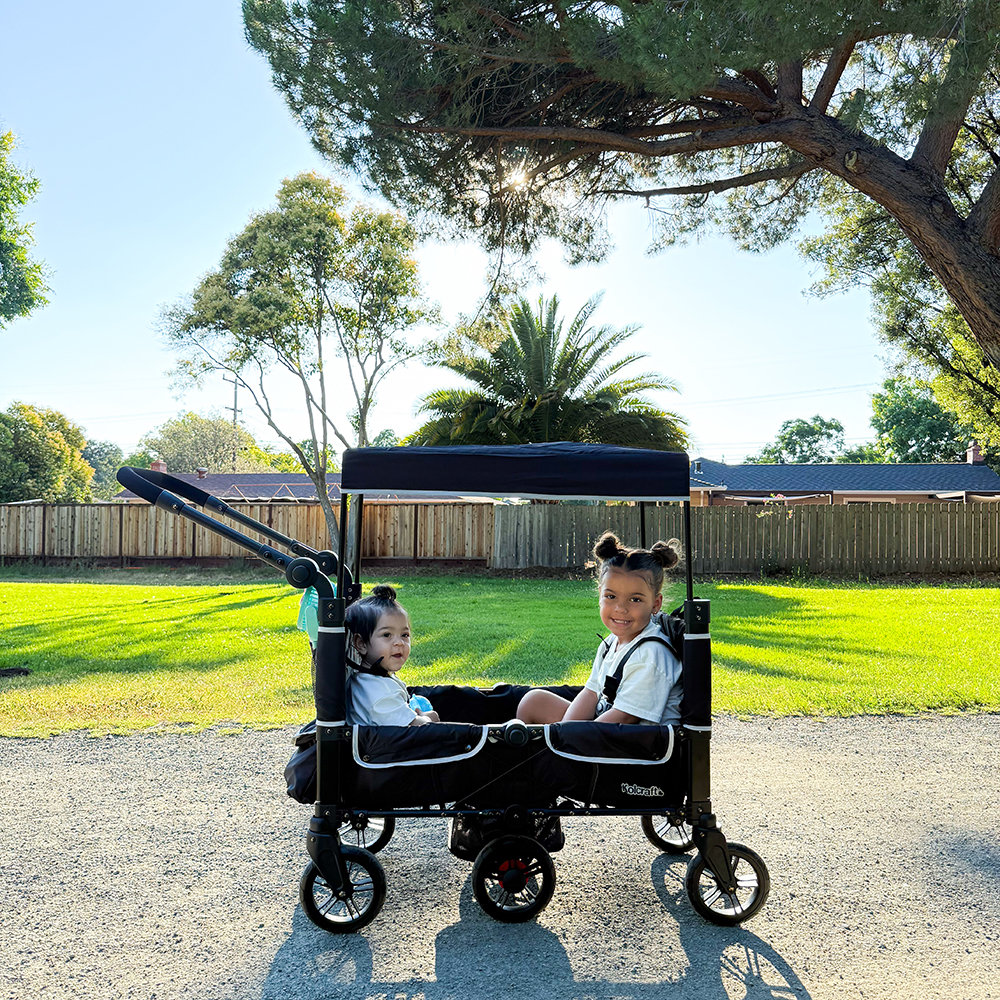 Kolcraft wagon with two kids